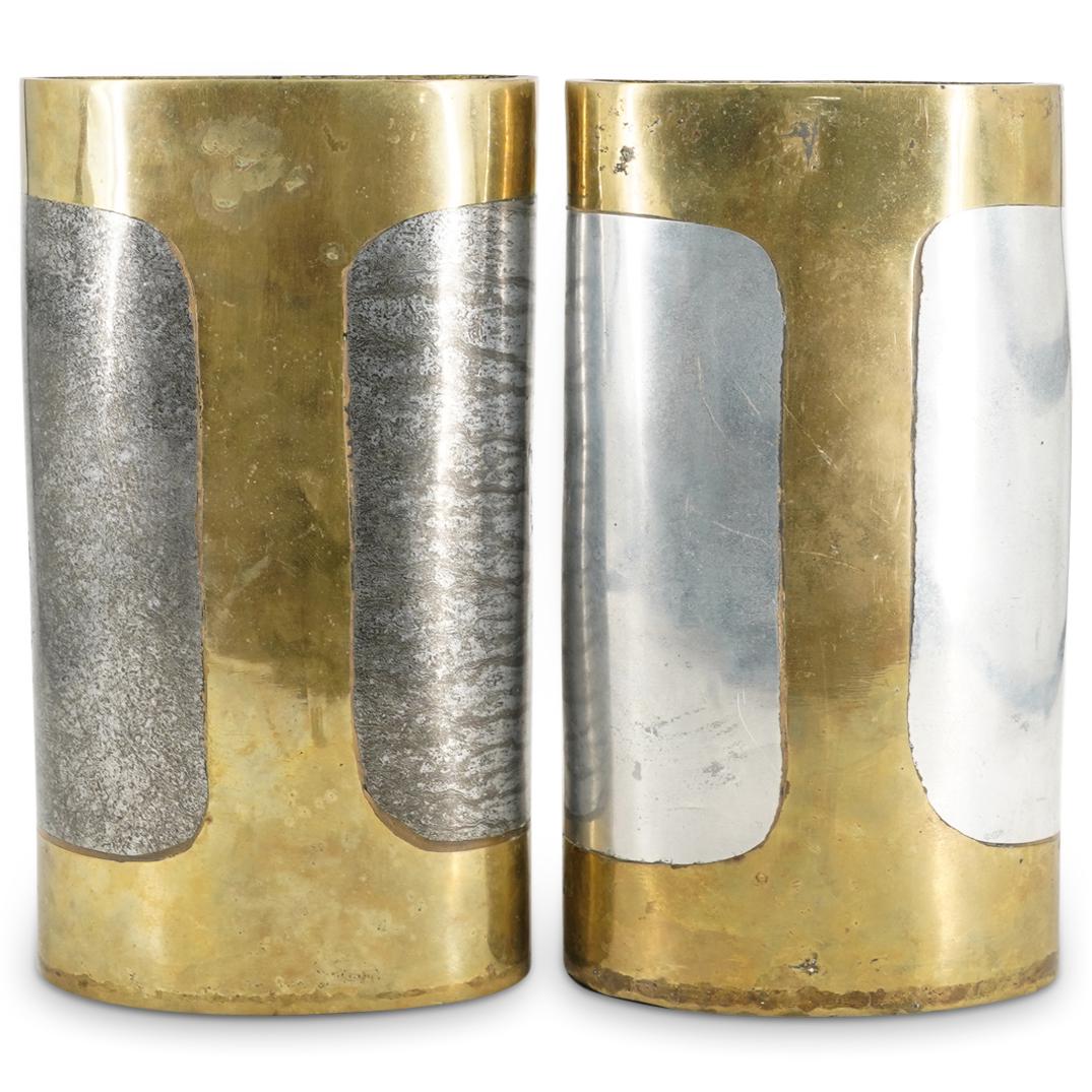 (2Pc) Probably David Marshall Bronze & Aluminum Vases: DESCRIPTION: (2Pc) Pair of Probably David Marshall; Mid-Century bronze oval vases with hemispherical aluminum inserts at the sides. CIRCA: Mid 20th Century ORIGIN: Europe DIMENSIONS: H: 13.5" W: 7.5"