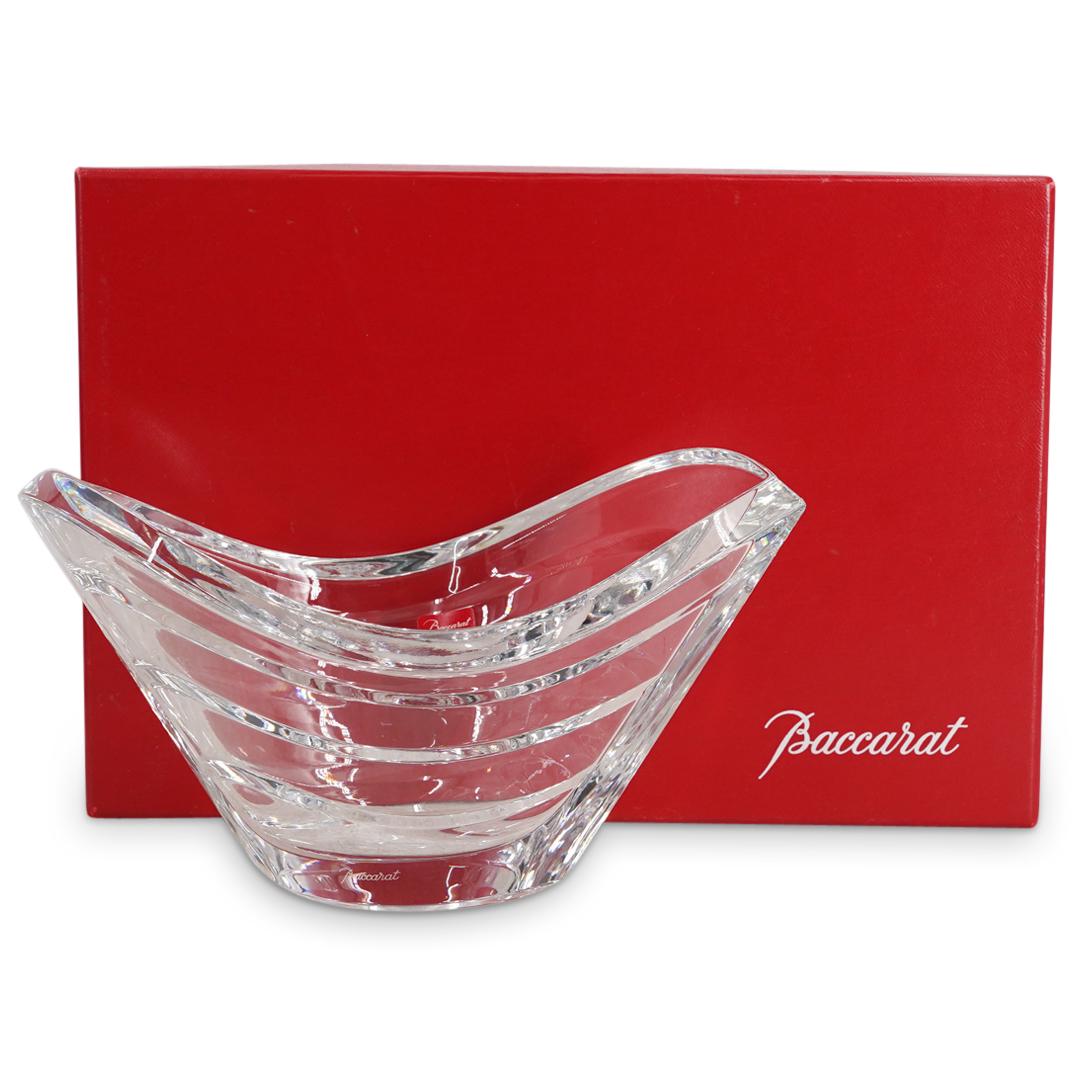 Baccarat Crystal Glass Wave Bowl: DESCRIPTION: Baccarat crystal glass bowl featuring internal, undulating tiers and a smooth exterior. Marked on underside with Baccarat hallmark. Includes box and paperwork CIRCA: 20th Century ORIGIN: 