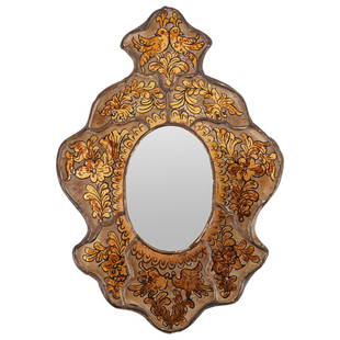 Antique Reverse Painted Mercury Glass Mirror: DESCRIPTION: Antique mercury mirror featuring a reverse painted glass frame detailing in a gold tone symmetrical foliate and flower designs alongside bird depictions at the top and lower. CIRCA: Early