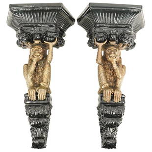 Pair of Large Castilian Monkey Wall Brackets: DESCRIPTION: Pair of large monkey wall brackets featuring naturalistic brass monkeys mounted to porcelain foundations with ebonized finish. Produced by Castilian, Marked: "Castilian" at verso, with wa