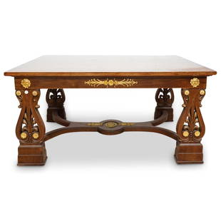 French Louis XV Style Library Table: DESCRIPTION: French Louis XV style library table with rectangular form, raised on open-work carved acanthus legs, completed with a scrolling stretcher, and ornate gilt bronze mounted elements. CIRCA: