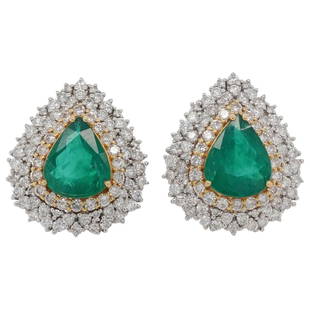 Pair of 18k White Gold, Emerald and Diamond Earrings: DESCRIPTION: A Pair of 18k white gold earrings, each centered by approx. 3ct Emeralds encompassed by an array of round cut Diamonds amounting to approx. 2cts each, stamped along the back "750". Total