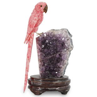 Amethyst Quartz and Agate Parakeet Sculpture: DESCRIPTION: An Parakeet sculpture carved from pink Brazilian agate and precious stone beak, the bird seats by inserts atop a Amethyst Quartz base, further fitted atop a wooden base. CIRCA: 21st Cent