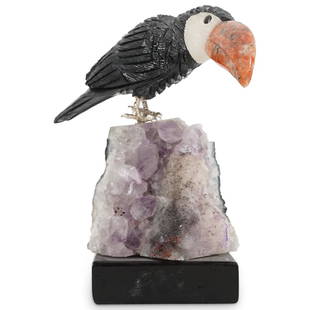 Amethyst Quartz and Onyx Toucan Sculpture: DESCRIPTION: A carved semi precious stone sculpture features a Toucan comprised of onyx, Fluorite, an other stones. The bird sits atop an Amethyst quartz rock specimen, further fitted atop a wooden ba