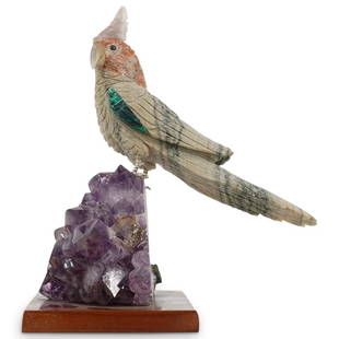 Amethyst and Semi Precious Stone Cockatoo: DESCRIPTION: A Cockatoo sculpture crafted from carved Quarts, Jasper and Malachite stone, seated atop a Amethyst quartz crystal specimen, further fitted atop a square wooden base. CIRCA: 21st Cent. OR