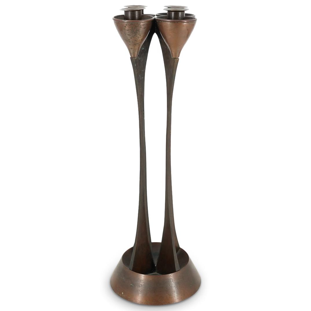 Art Nouveau Bronze Candelabrum: DESCRIPTION: Art Nouveau candelabra featuring four sockets atop long narrow stalks mounted in a round base. CIRCA: 20th Century ORIGIN: Germany DIMENSIONS: H: 19.25" L: 6.5" Have a similar item to sel