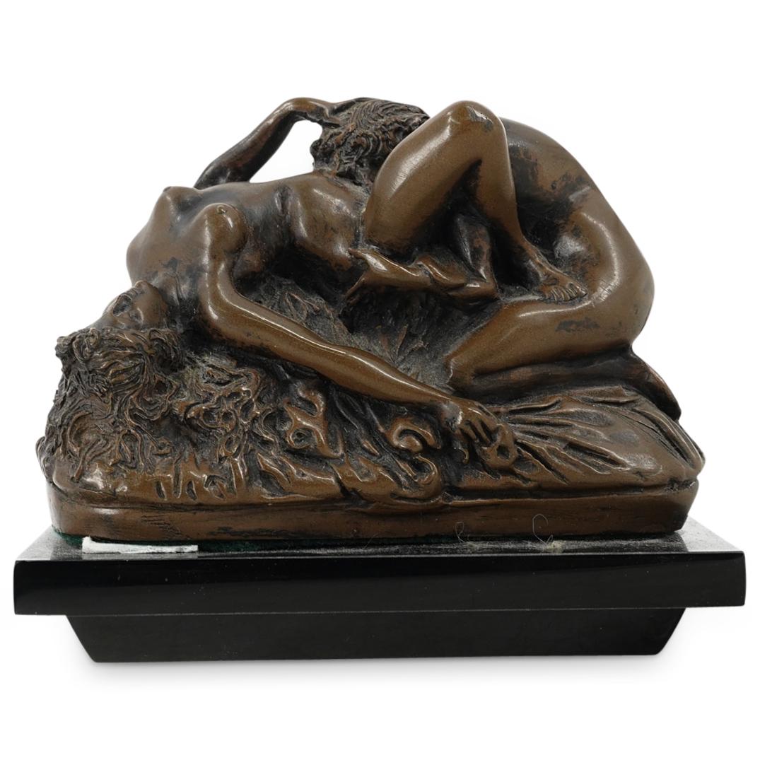 After Jef Lambeaux Erotic Resin Sculpture: DESCRIPTION: Erotic resin sculpture after Belgian artist Jef Lambeaux work depicting two women in an embrace and lacquered with a bronze tone. Mounted on a black lucite base with two clear feet. CIRCA