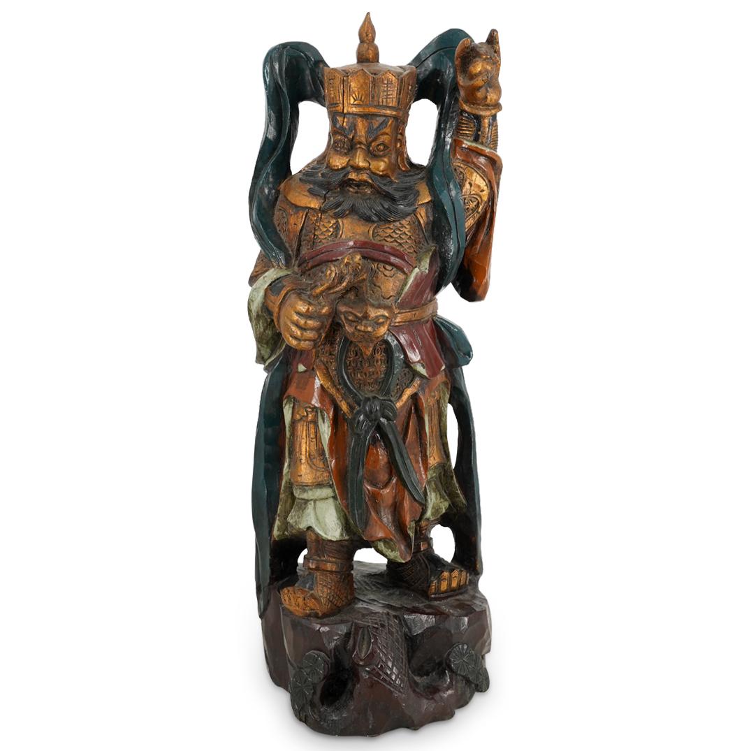 Antique Carved Lacquered & Gilt Wood Chinese Emperor Sculpture: DESCRIPTION: Antique Chinese carved wood emperor sculpture polychrome lacquered throughout and parcel gilt depicted wearing armor, a crown and boots with his left hand raised and gripping an orb with 