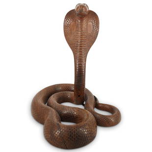 Vintage Indian Carved Rosewood Cobra Sculpture: DESCRIPTION: VIntage Indian carved rosewood sculpture of a cobra coiled and its neck prostrate with details of a metal tongue, inset white bead eyes and scales throughout. CIRCA: Mid 20th Century ORIG