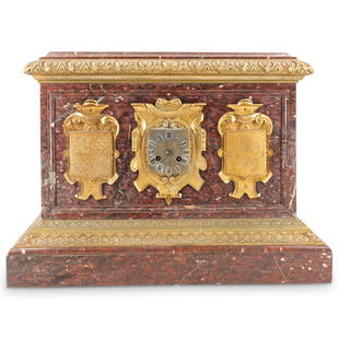 Antique French Empire Rouge Marble & Bronze Mantel Clock: DESCRIPTION: French Empire mantel clock featuring a rouge marble casing with gilt bronze applications including six depicting the crests of various Dutch provinces. Piece is embellished with gilt