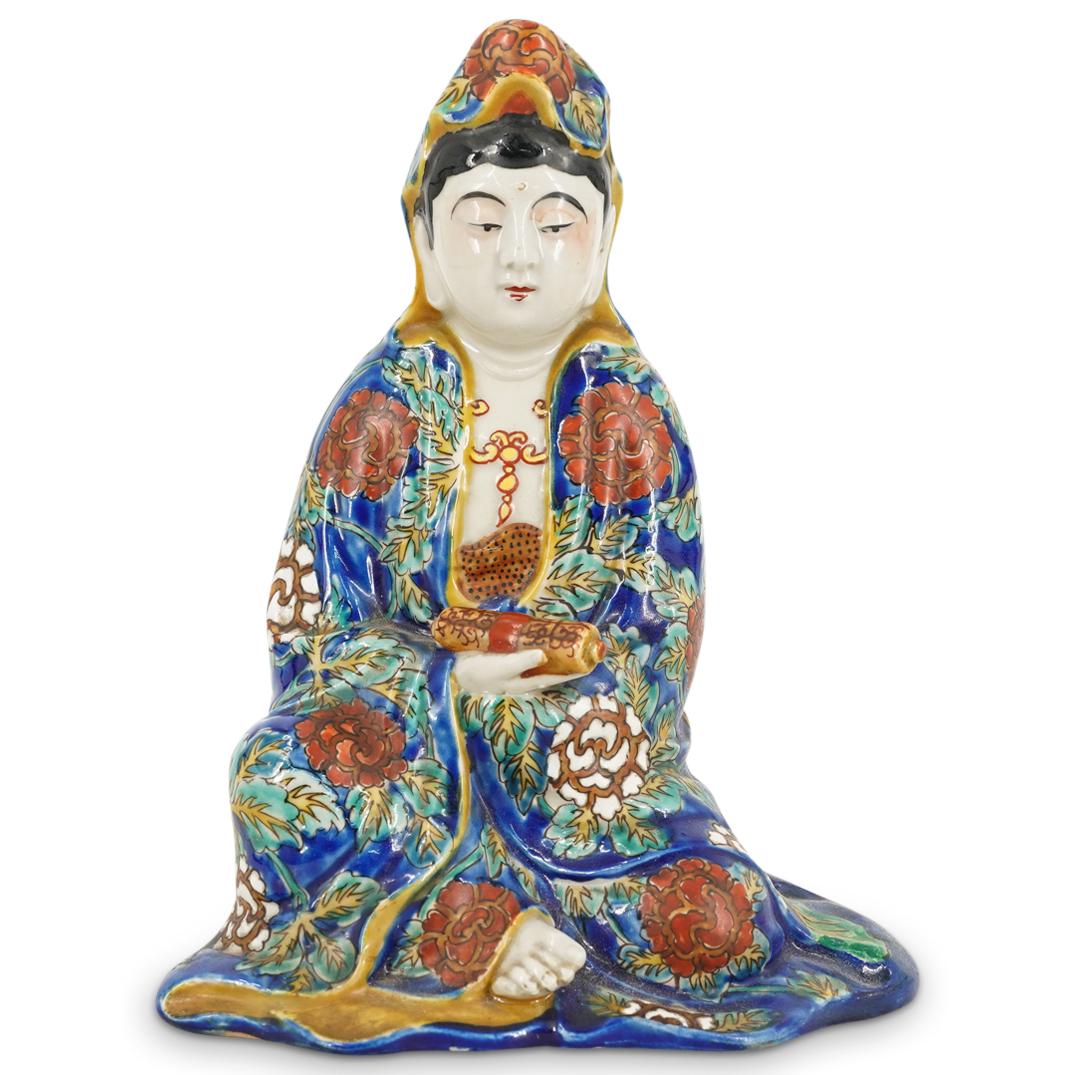 Antique Chinese Porcelain Guan Yin: DESCRIPTION: Porcelain sculpture depicting Guan Yin wearing a hooded headdress while seated in the posture of royal ease and holding a scroll with her right hand. Figure's robe is decorated throughout