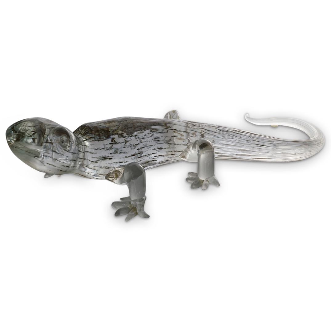 Elio Raffaeli & Roberto Cammozzo Murano Glass Lizard: DESCRIPTION: Murano glass sculpture by Elio Raffaeli and Roberto Cammozzo depicting a lizard decorated with interior aventurescent accents. Signed on tail behind right hind leg. CIRCA: 20th Century OR