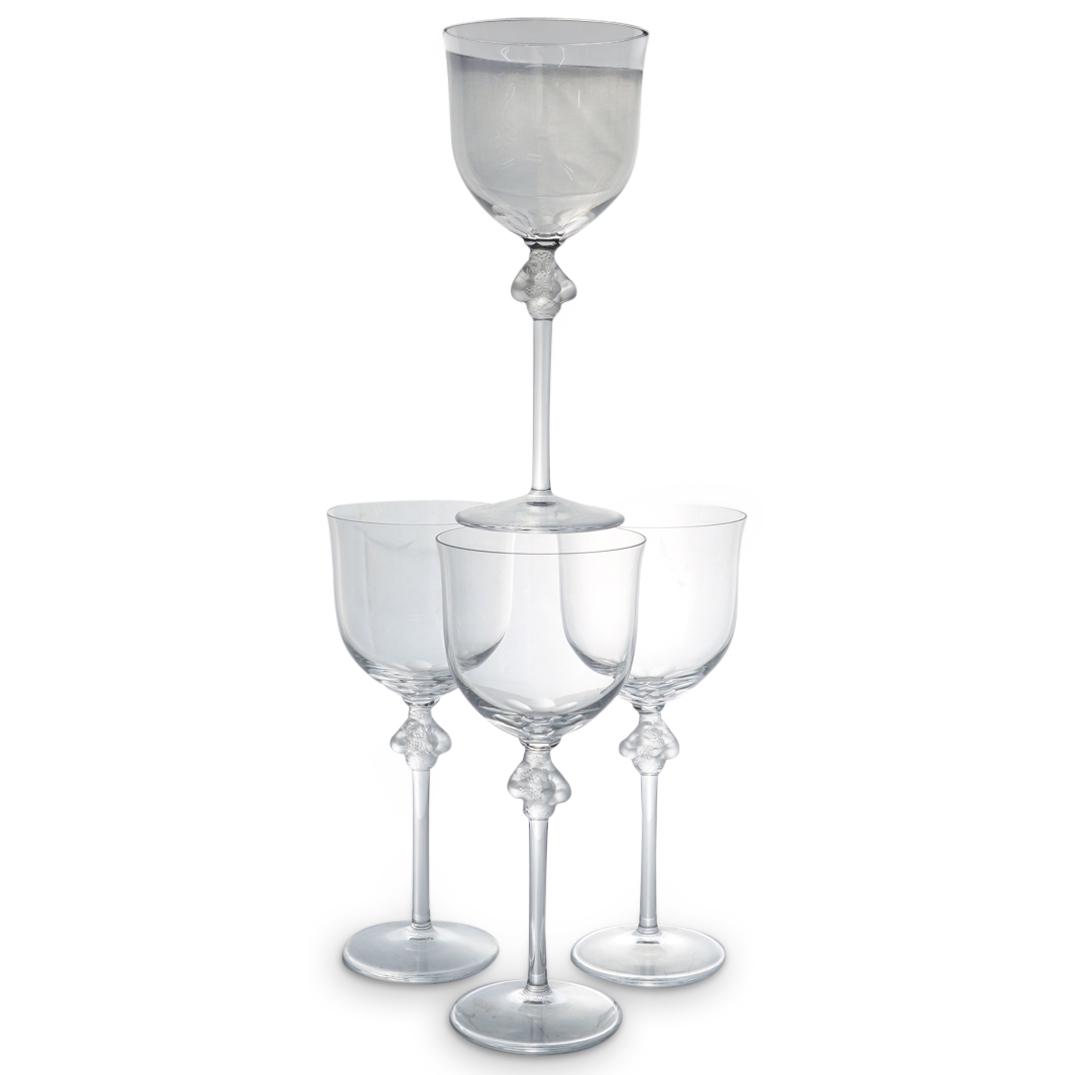 (4 Pc) Lalique Crystal "Roxane" Wine Glasses: DESCRIPTION: (4 Pc) Lalique crystal stemware wine glasses, in the "Roxane" pattern. Marked with the "Lalique France" etched signature on the underside. The stem is decorated with a frosted motif depic
