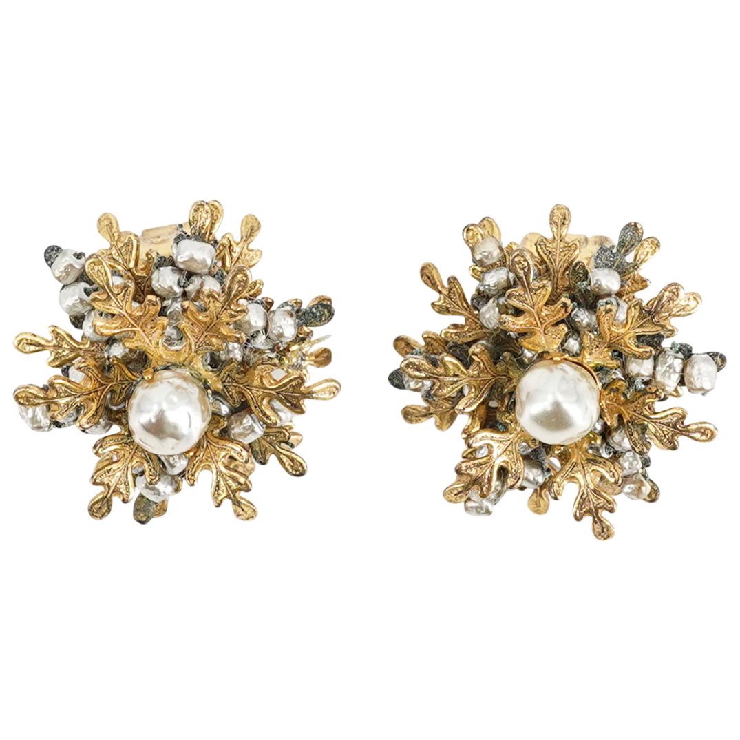 1950s Miriam Haskell Earrings: DESCRIPTION: A vintage Miriam Haskell pair of 1950s costume jewelry beaded clip earrings designed with a snowflake shape and crafted with gold tone filigree and pearls. Miriam Haskell (July 1, 1899 â
