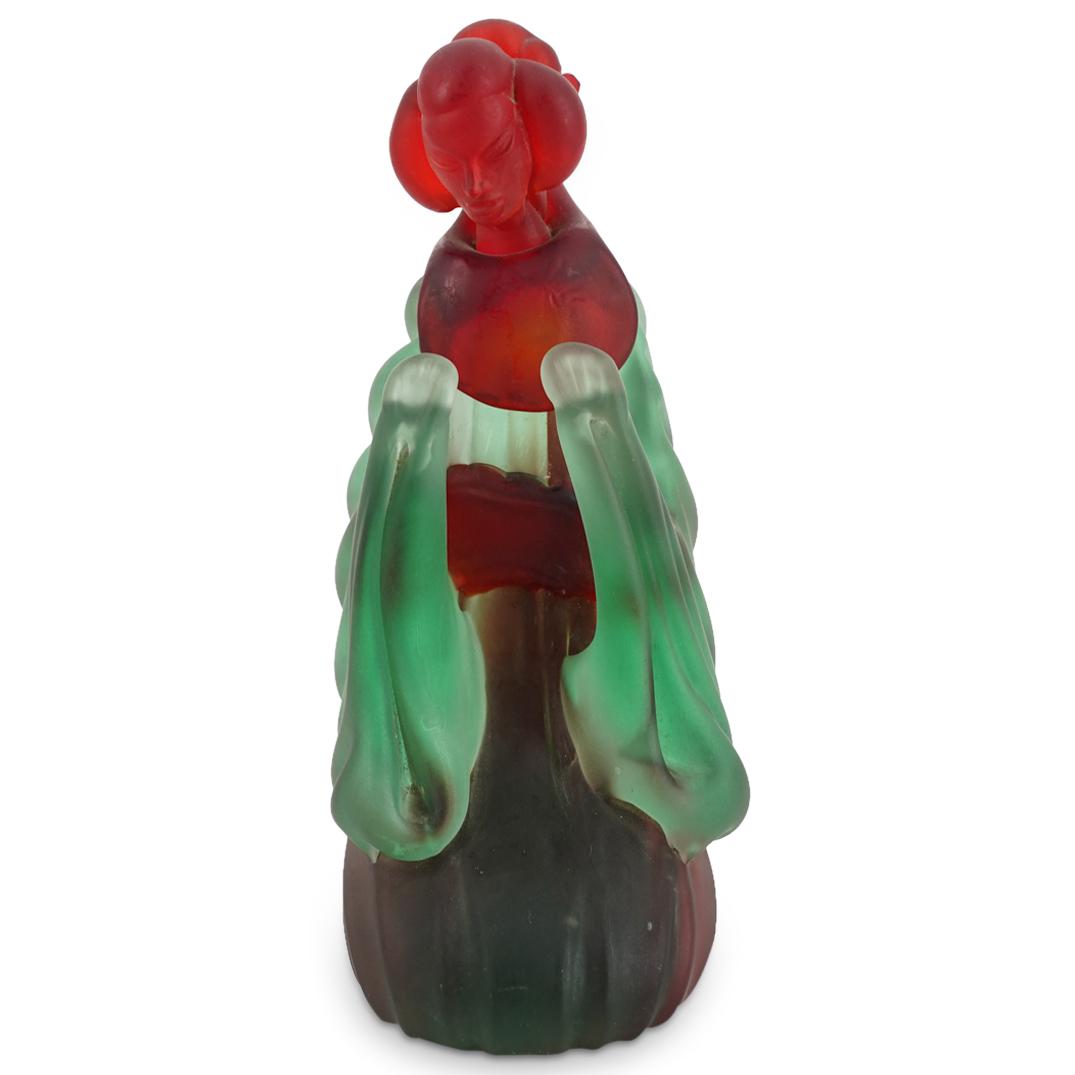 Vintage Japonisme Frosted Glass Geisha Sculpture: DESCRIPTION: Frosted glass sculpture depicting a green and red geisha seated on her heels with her hands before her. CIRCA: 20th Century ORIGIN: European DIMENSIONS: H: 9" W: 5.75" L: 4" Have a simila
