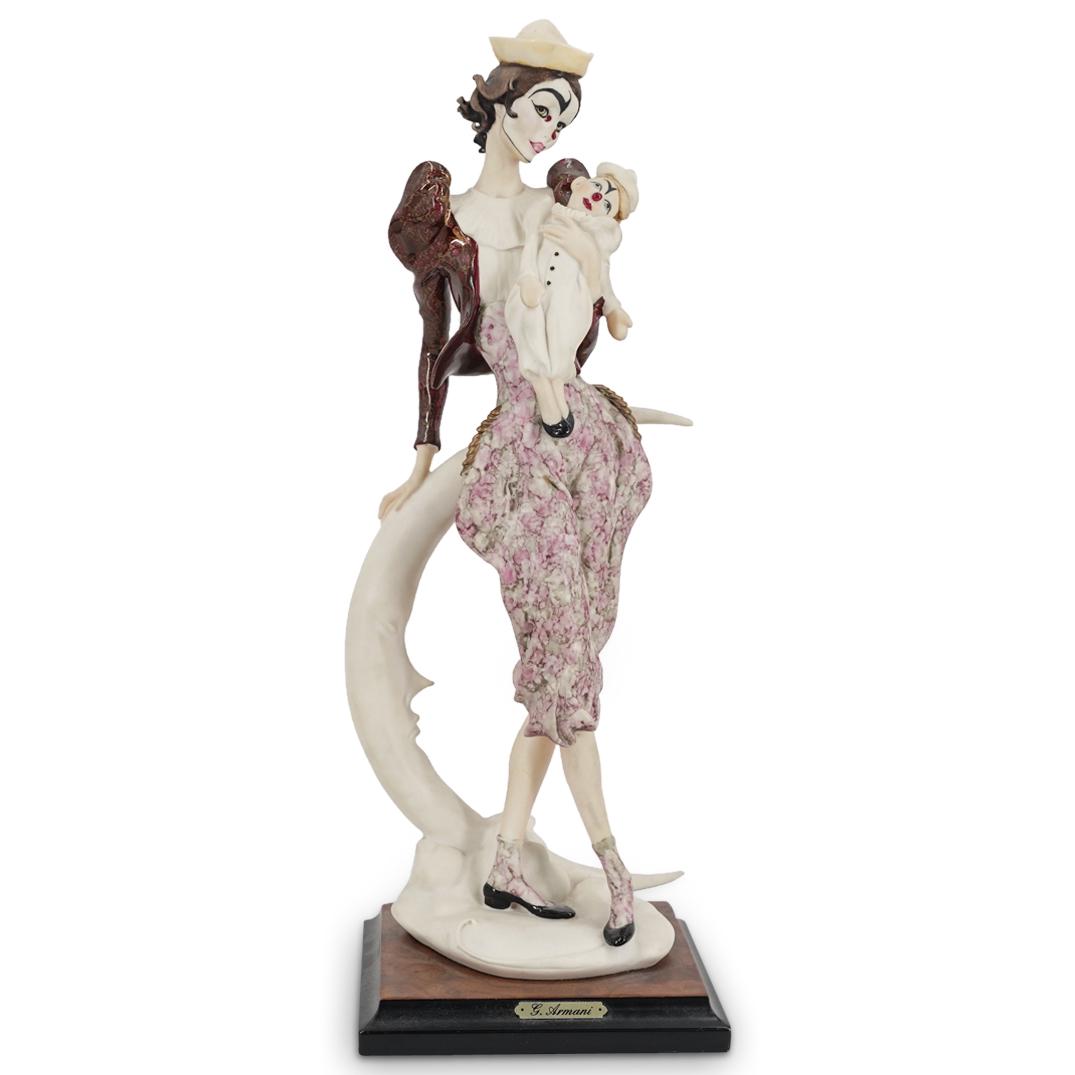 Giuseppe Armani "Lady Pierrot W/ Doll" Porcelain Sculpture: DESCRIPTION: Porcelain sculpture entitled "Lady Pierrot W/ Doll" by Giuseppe Armani depicting a female clown standing next to a crescent moon and holding a clown doll in her left arm. Piece is mounted