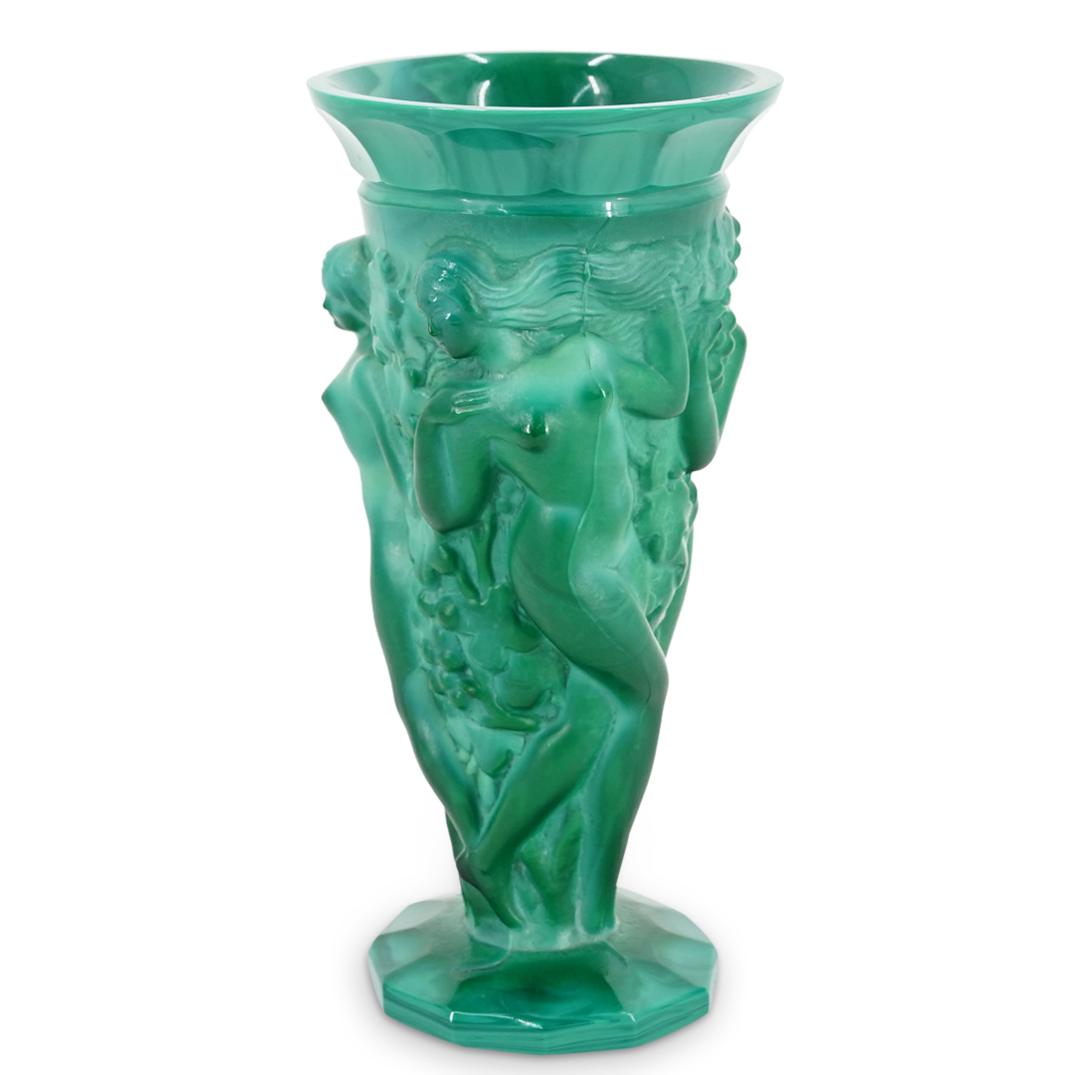 Bohemian Malachite Glass Nude Figural Vase: DESCRIPTION: Bohemian vase composed of malachite glass and decorated with designs in relief depicting nude woman among grapevines. CIRCA: Early 20th Century ORIGIN: Czechoslovakia DIMENSIONS: H: 8.75"