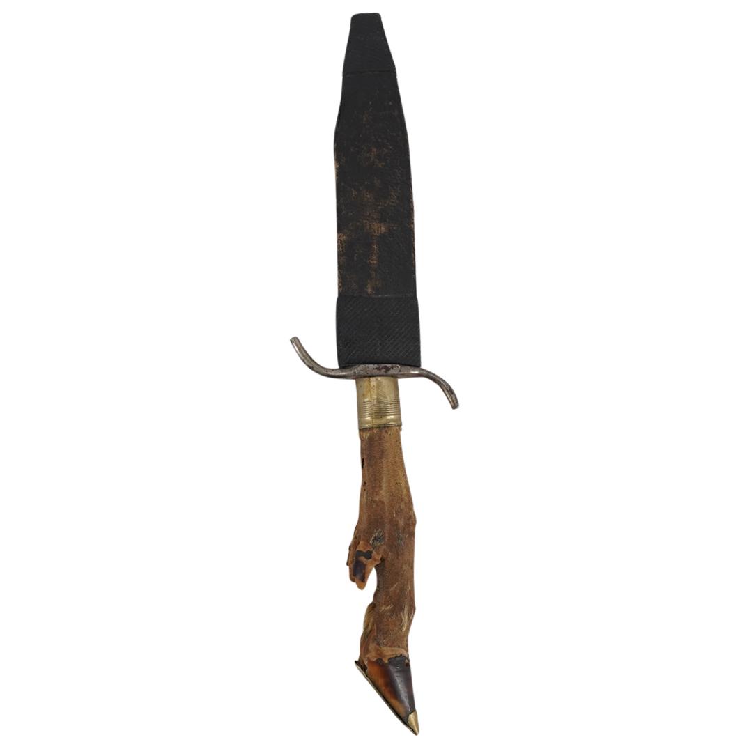 Antique German Deer Foot Handle Hunting Dagger: DESCRIPTION: Hunting gagger featuring a deer foot handle and a black, leather sheath. Handle is decorated on hoof with covering and bronze component. Blade is marked with a "JR" over "JUNIOR" and bene