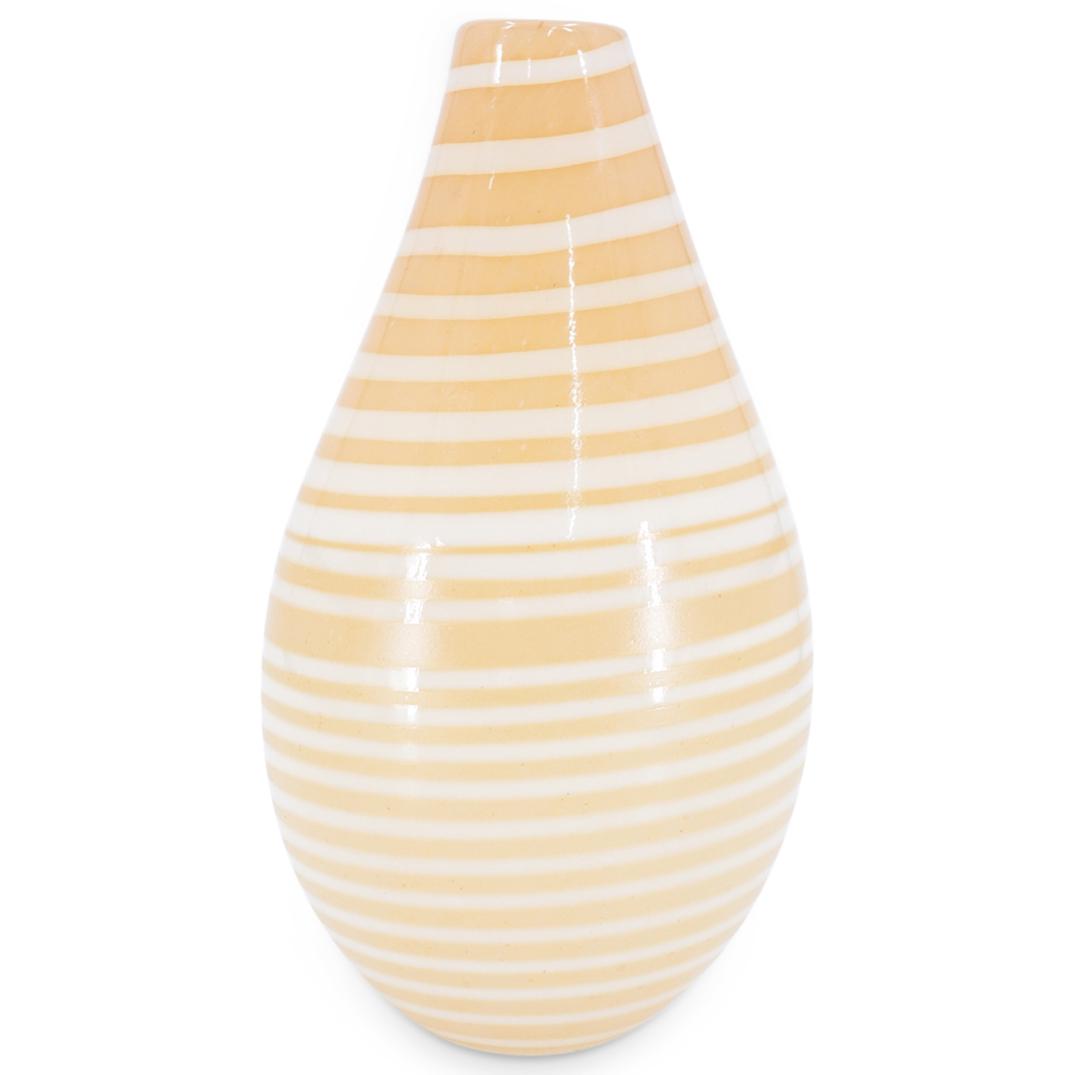 Kosta Boda Art Glass Vase: DESCRIPTION: A Kosta Boda art glass bud vase with striped pattern in white and light vanilla colors, with hand-engraved artist signature on the underside and date 1972. CIRCA: 20th Century ORIGIN: Swe