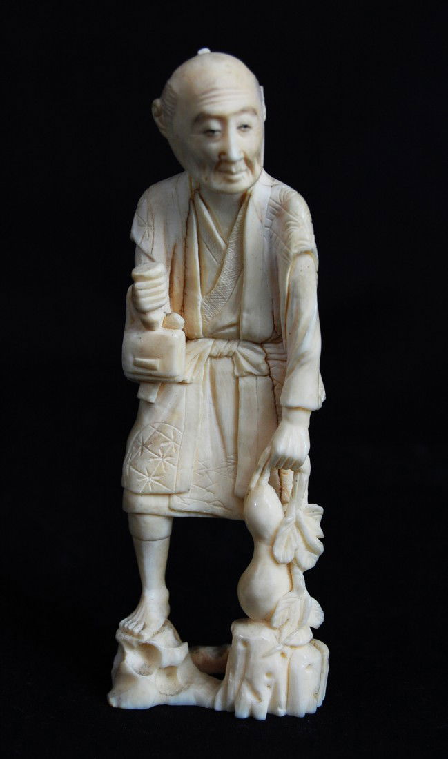 Chinese Ivory Figurine. Signed