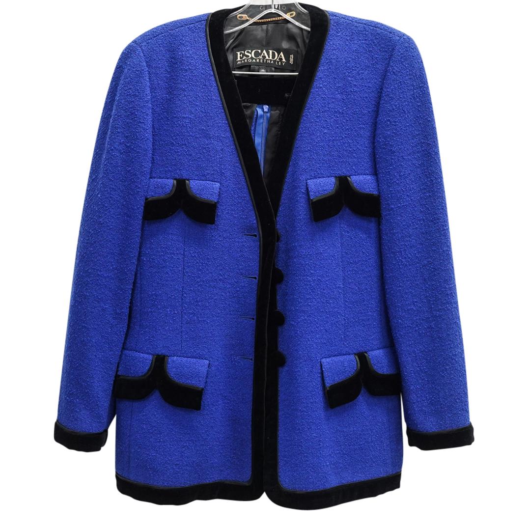 (2 Pc) 1980s Escada Blue Wool & Velvet Suit Ensemble: DESCRIPTION: (2 Pc) A vintage 1980s Escada Magaretha Ley blue wool and black velvet two-piece blazer and skirt suit ensemble. Size 36. CIRCA: 20th Century ORIGIN: Germany DIMENSIONS: Jacket shoulder t