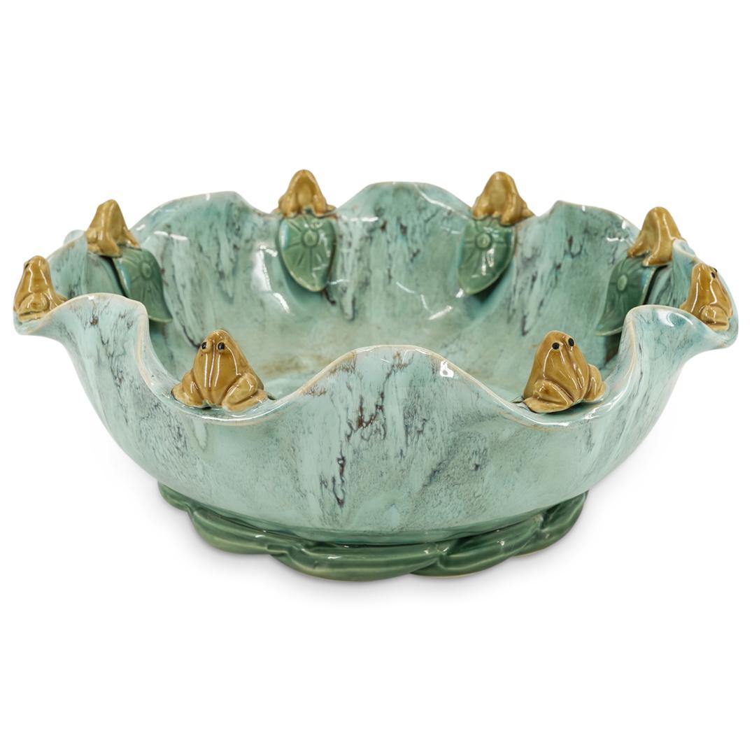 Large Flambe Frog Centerpiece Bowl: DESCRIPTION: A large flambe glazed stoneware centerpiece bowl with frogs and lilly pad forms. CIRCA: 20th Century ORIGIN: China DIMENSIONS: H: 6" x D: 15" Have a similar item to sell? Contact: Info@Ak