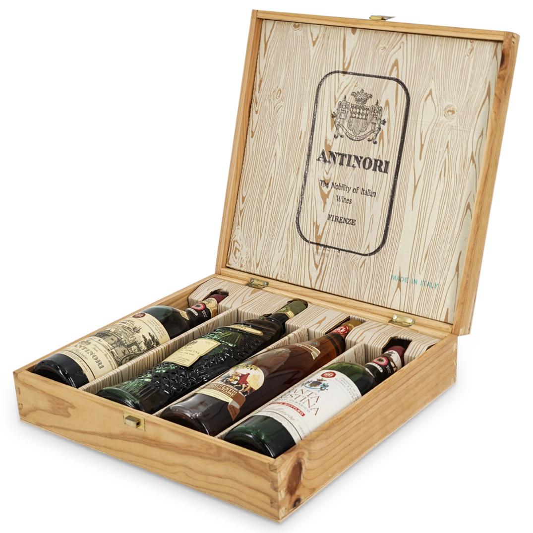 (5 Pc) Antinori Wine Box Set: DESCRIPTION: Box set of four bottles of Antinori brand wine including original wooden box. Type of alcohol and bottle size are as follows: Bianco Della Costa Toscana White Tuscany Wine for Fish - 23.2