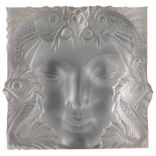 Lalique "Masque De Femme" Glass Plaque: DESCRIPTION: Lalique "Masque De Femme" glass plaque. Designed by Rene Lalique in 1935 to decorate a fountain, "Woman Mask" reveals the face of a mysterious woman with delicate features, surrounded by