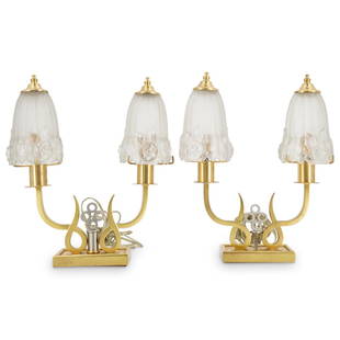 Jules Leleu Table Lamps: DESCRIPTION: Jules Leleu table lamps with gilt bronze foundations and interwoven designs, fitted wit0 double light sockets and frosted glass shades. CIRCA: Early 20th Century ORIGIN: France DIMENSIONS