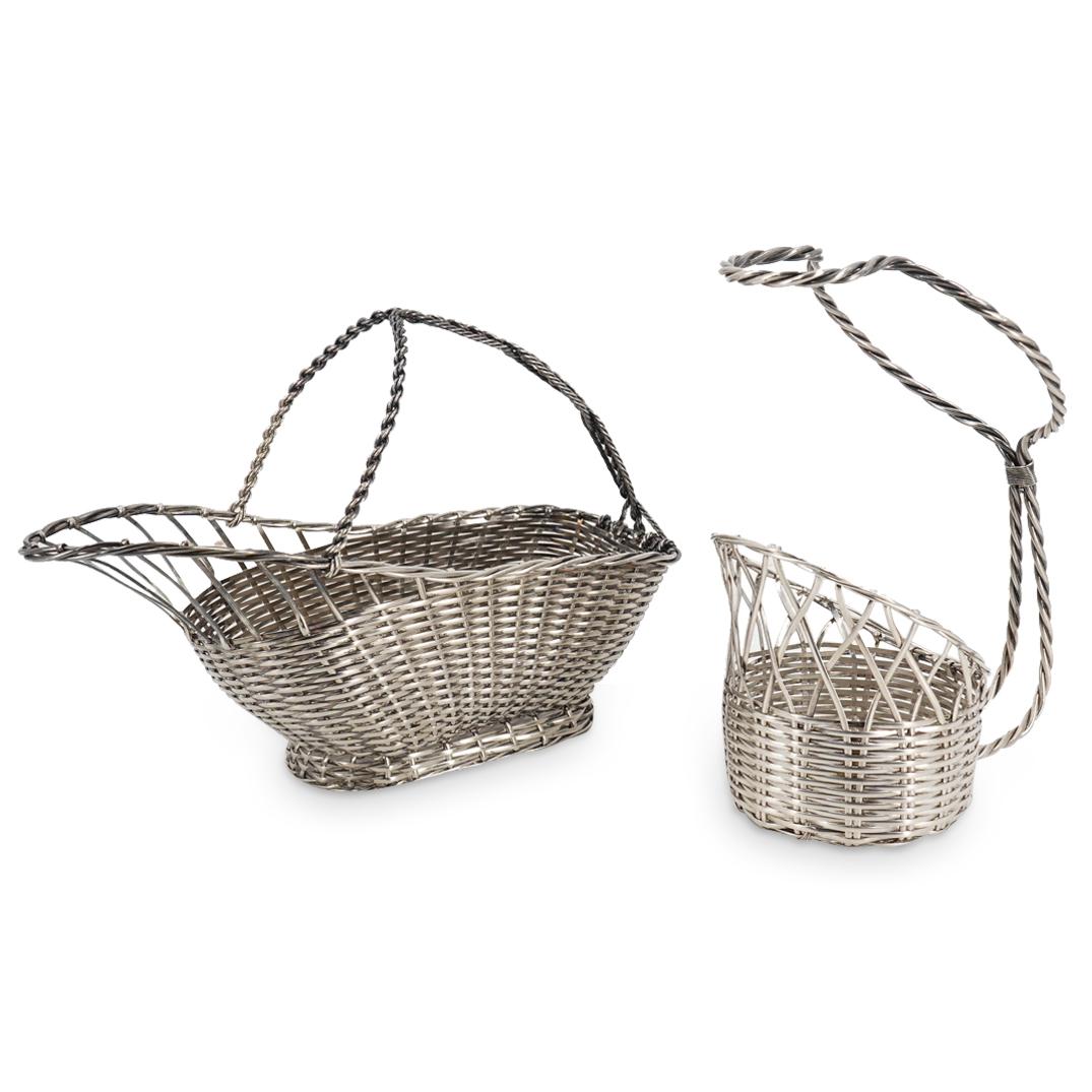 Pair Of French Sterling Silver Finely Woven Wine Holders: DESCRIPTION: Two Christofle style sterling silver wine holders, each composed of finely woven strands of silver. One piece holds wine bottles upright and has a handle which loops around; the other hol