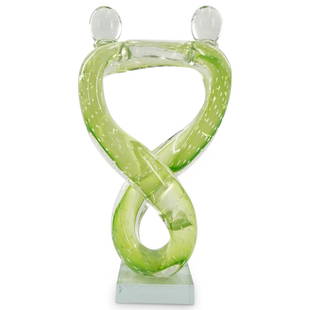 Lavorazione Murano Glass Couple Sculpture: DESCRIPTION: Lavorazione Murano glass sculpture depicting two conjoined helical minimalist figures and a translucent lime green tone throughout. Sticker at the side of the square base "Lavorazione Art