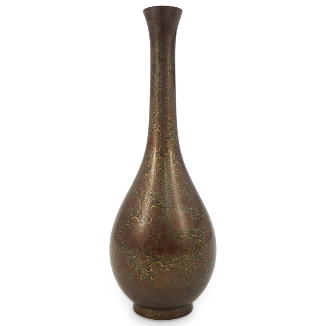 Antique Japanese Meiji Bronze Vase: DESCRIPTION: Antique Japanese Meiji bronze vase with bronze and gilt inlaid patina. CIRCA: Early to Mid 20th Century ORIGIN: Japan DIMENSIONS: H: 6.5" x D: 2.75" Have a similar item to sell? Contact: 