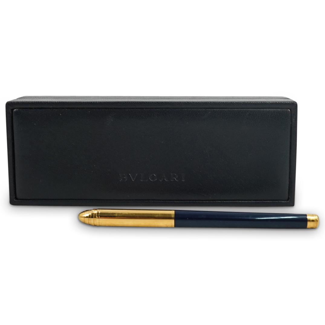 Vintage Bvlgari Gold-Plated Lacquered Writing Pen: DESCRIPTION: A vintage Bvlgari gold plated and black-lacquered writing pen with dust bag and original case. CIRCA: 20th Century DIMENSIONS: L: 5 1/2" Have a similar item to sell? Contact: Info@Akibaan