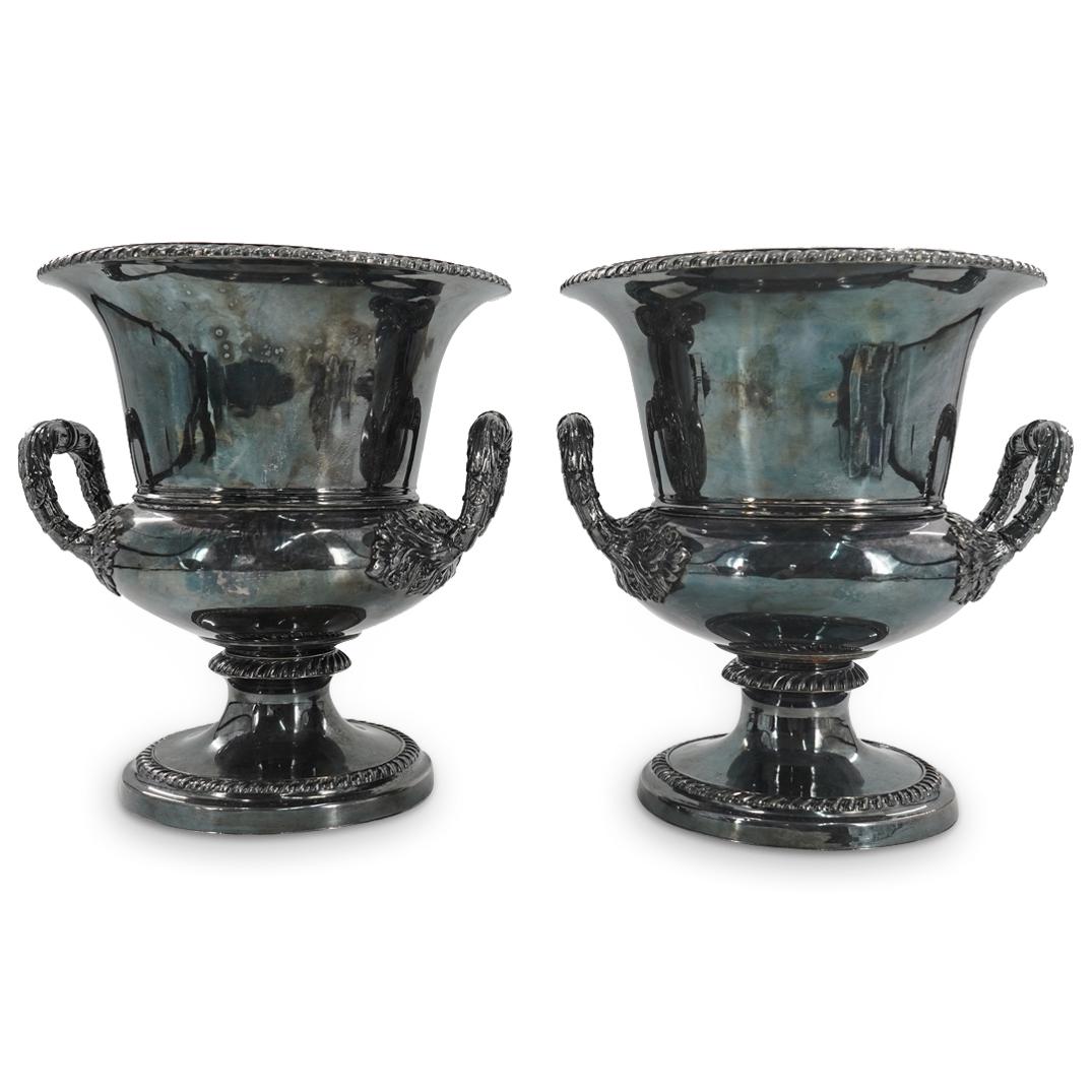 Pair Of Antique French Silver Plated Wine Coolers: DESCRIPTION: Two matching silver plated wine Coolers, each featuring foliage form handles and braid patterns around the lip, stem, and foot. CIRCA: Late 19th to early 20th Century ORIGIN: France DIMEN