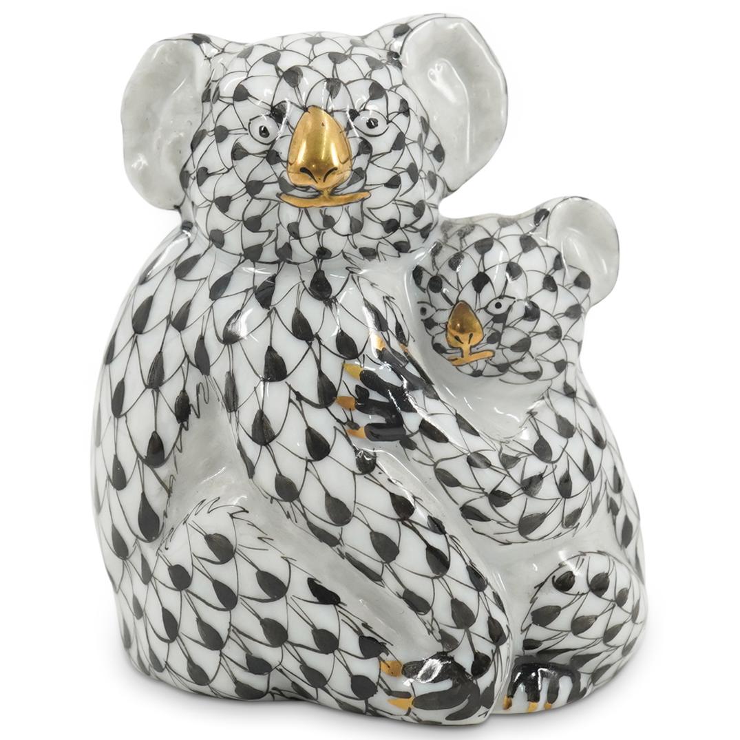 Herend Porcelain "Koala Mother & Baby" Figurine: DESCRIPTION: Herend porcelain figurine of a "Koala Mother & Baby" embellished in a black hued fishnet pattern. Finished with gilded accents. Style:#15478. Marked along the underside with Herend stamps