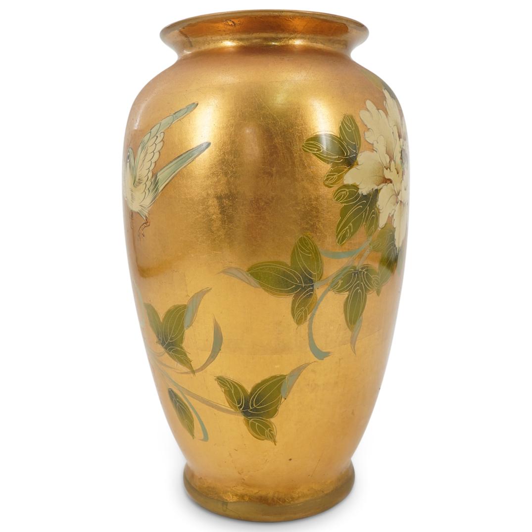 Vintage Japanese Gilt Porcelain Vase: DESCRIPTION: Gilt porcelain vase featuring polychrome bird, floral, and foliage motifs. Marked on underside with Han character. CIRCA: 20th Century ORIGIN: Japan DIMENSIONS: H: 11.75" D: 7.25" Have a 