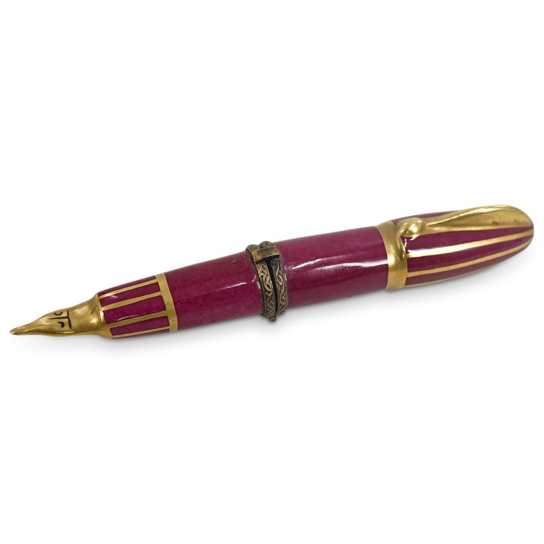 Limoges Porcelain "Writing Pen" Trinket Box: DESCRIPTION: A Limoges porcelain trinket box depicting a writing pen. Marked with "Limoges" signature hallmark, and "GR" artist initials. CIRCA: 20th Century ORIGIN: France DIMENSIONS: L: 4 1/4" Have 