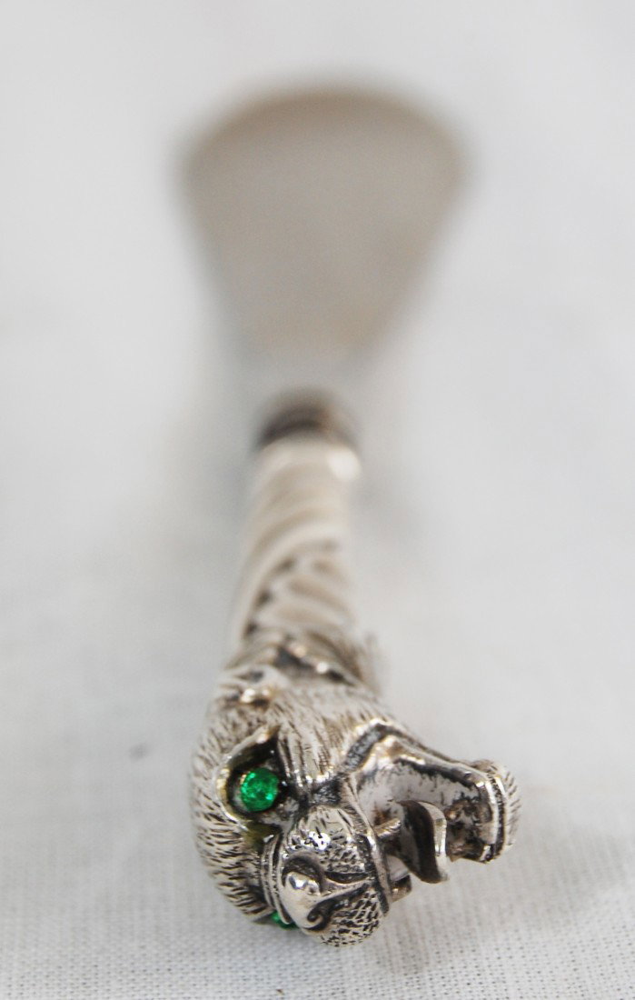 Silver shoe horn with stones: Silver shoe horn with stones. handle as panther. Circa 1910s