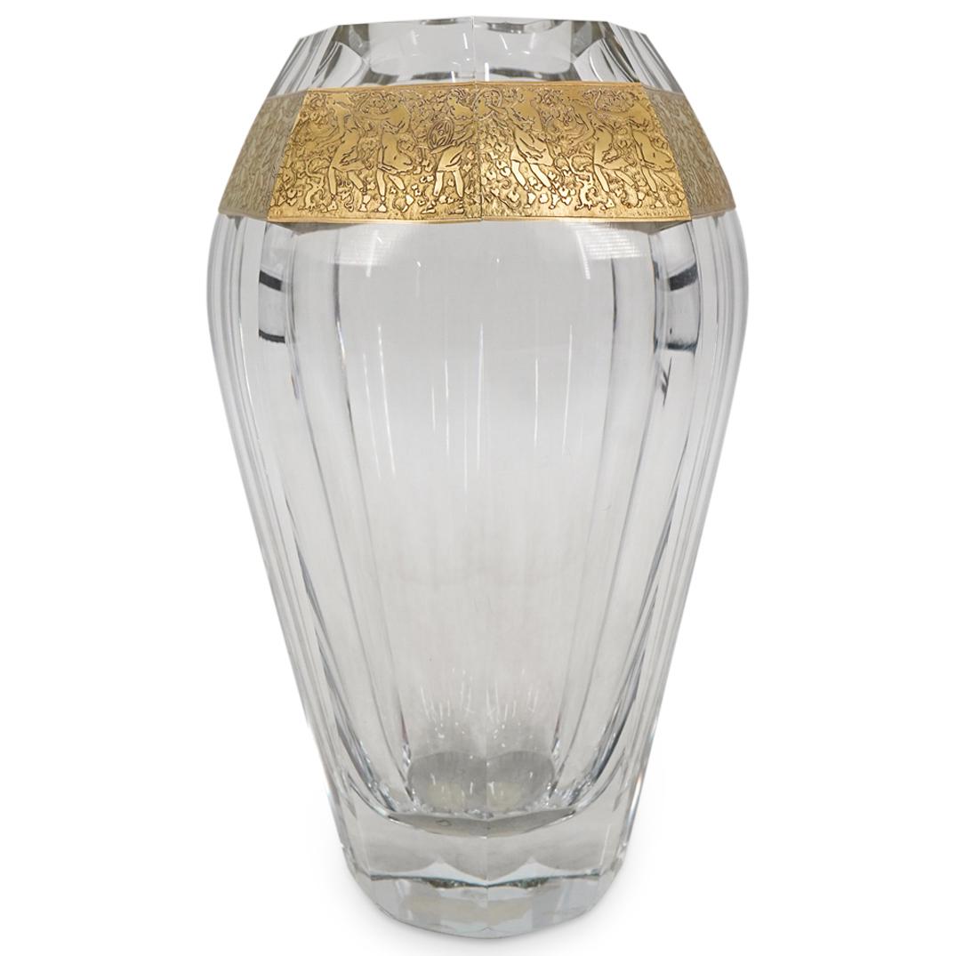Moser Bohemian Glass Faceted Clear Vase: DESCRIPTION: Bohemian glass Moser vase featuring a cut, eight faceted side decorated near the lip with gilt scenes in low relief of neoclassical warrior maidens among grapevines. CIRCA: 20th Century O
