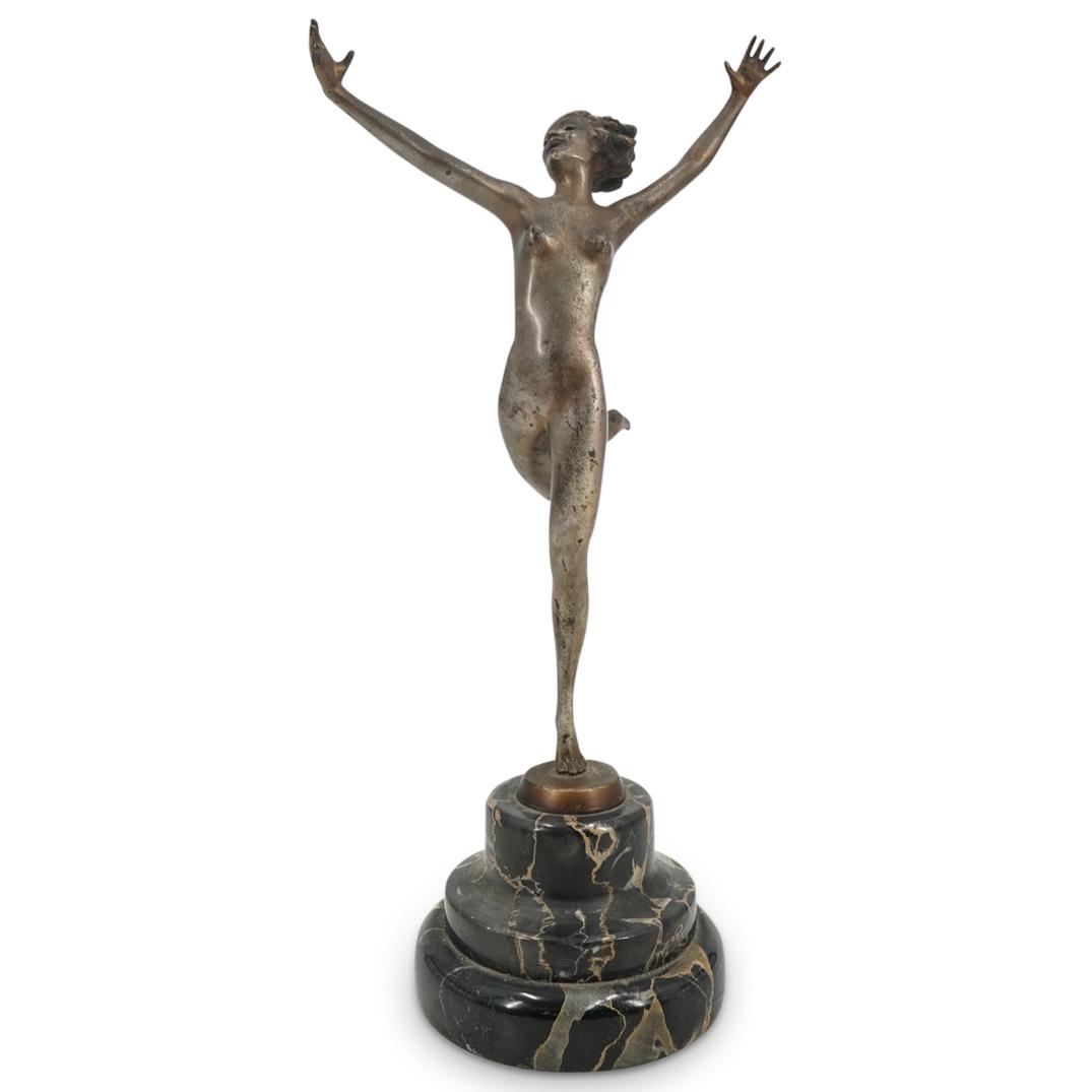 Josef Lorenzl (1892-1950) Art Deco Nude Dancer: DESCRIPTION: Art Deco bronze sculpture by Josef Lorenzl depicting a nude maiden poised on her left toes with her right leg behind her and her arms spread above her head. Piece is signed "LORENZL" behi