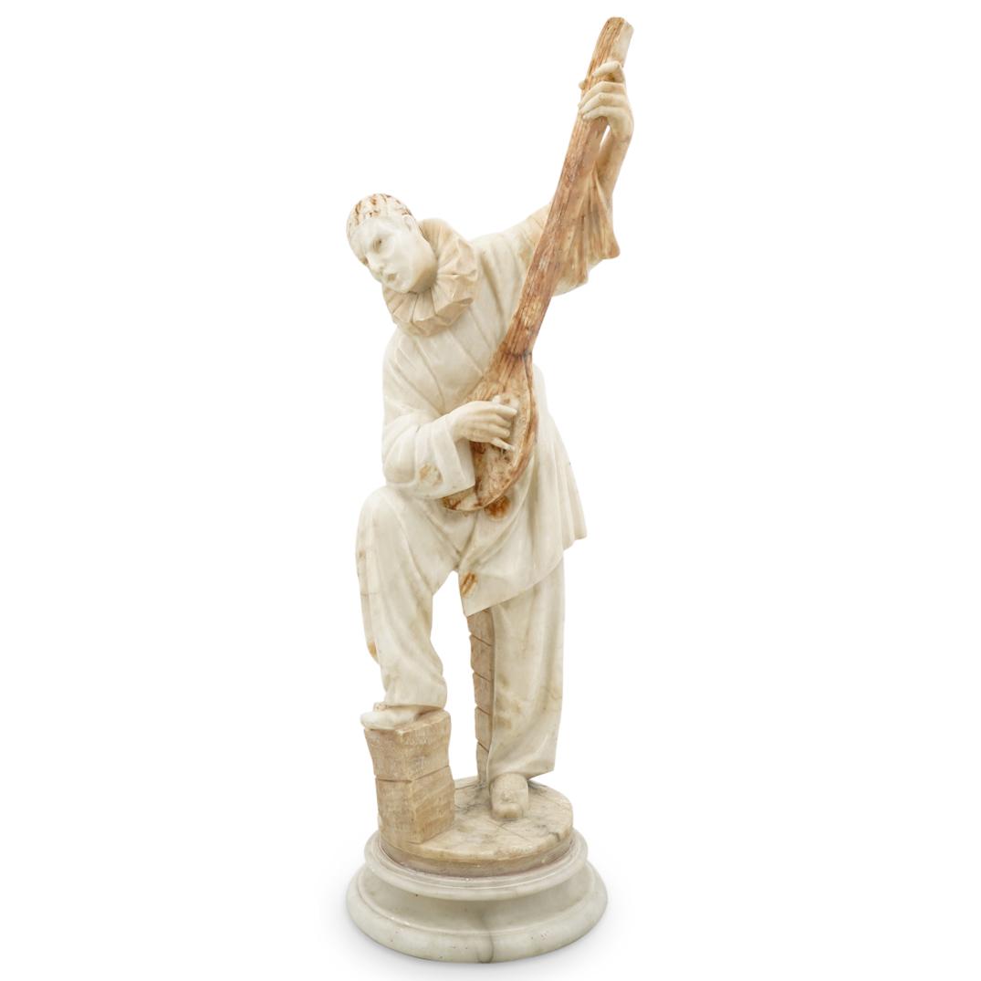 Febo Trafeli (Italian, 1894-1935) Pierrot Alabaster Sculpture: DESCRIPTION: Carved alabaster sculpture by Italian artist Febo Trafeli (1894-1935), depicting the character Pierrot standing atop a partial stone column while singing and playing a lute. CIRCA: Early