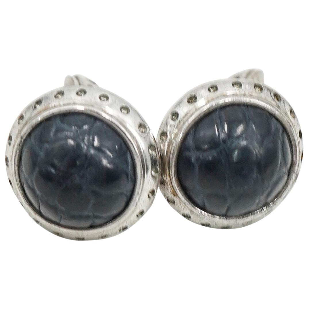 Pair Of Stefano Ricci Sterling Silver And Crocodile Cuff Links: DESCRIPTION: Stefano Ricci cuff links featuring a sterling silver foundation embellished with crocodile skin on the buttons. CIRCA: 20th Century ORIGIN: Italy DIMENSIONS: H: 1.25" D: 0.75" Have a simi
