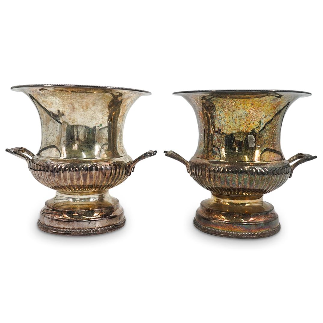 Pair Of Vintage Argentine Silver Plated Wine Coolers: DESCRIPTION: Two matching silver plated wine coolers, each featuring handles on either side of its ribbing. Each piece is decorated on its flared lip with a textured geometric design and is finished o