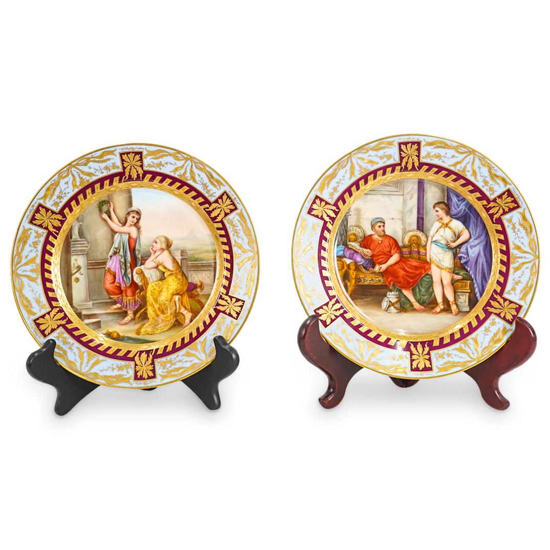 Pair Of Royal Vienna Neoclassical Porcelain Plates: DESCRIPTION: Two matching Royal Vienna porcelain plates, each decorated in its well with a neoclassical painting: one after Hadrian and Antinous by Otto Knille depicting Roman Emperor Hadrian and Anti