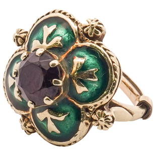 Antique 14k Gold, Ruby and Enamel Ring: DESCRIPTION: Antique 14k yellow gold ring designed with a four clover setting decorated with green enameling and leaf patterns, finished by a centered round cut Ruby weighing approx. 1.5cts. Total Wei