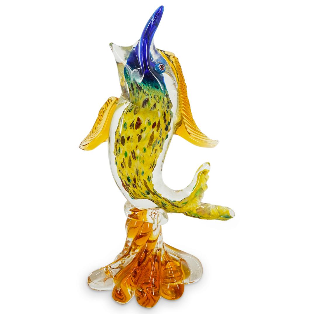 Murano Glass Fish Sculpture: DESCRIPTION: Murano glass sculpture of a fish with multicolor gradients as well as interior spotted design, details of fins and a tail atop a amber spiraling base. CIRCA: 20th Century ORIGIN: Italy DI