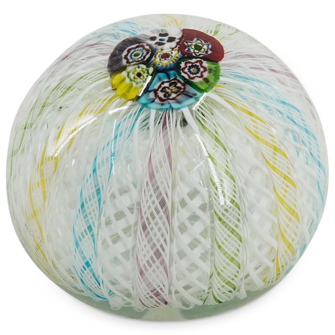 Murano Glass Magnum Latticino Ribbon Paperweight: DESCRIPTION: A Murano glass magnum paperweight with white, yellow, and blue, concentric latticino ribbon design and multicolor millefiori center. CIRCA: 20th Century ORIGIN: Italy DIMENSIONS: H: 3" x 