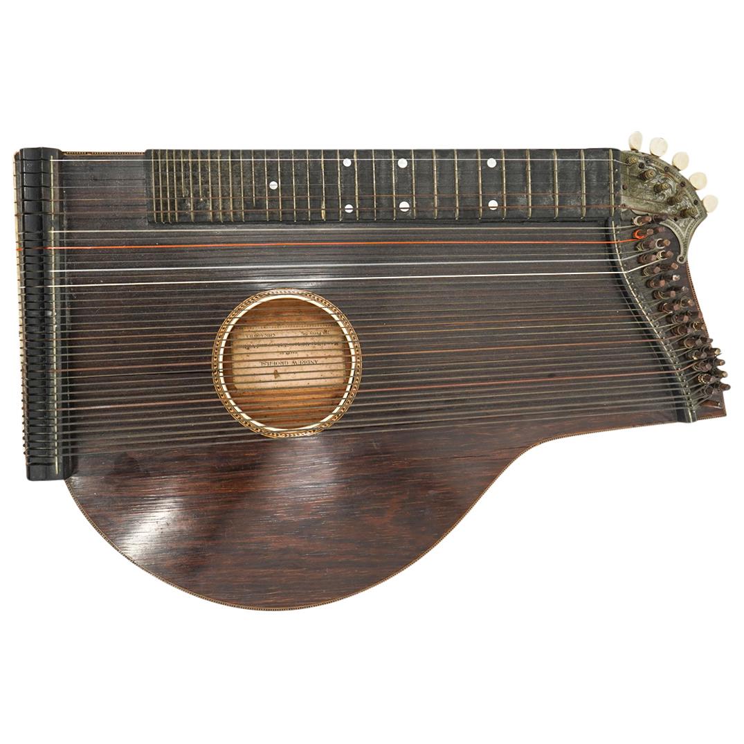 Andrew Groehsl (1859 -1952) Zither: DESCRIPTION: Antique Zither a class of stringed instrument composed of rosewood with bone trims. Label "Andrew Groehsl Maker Of Mandolins, Guitars, Zithers, And Violins, 755 Perry Street, Chicago ILL"