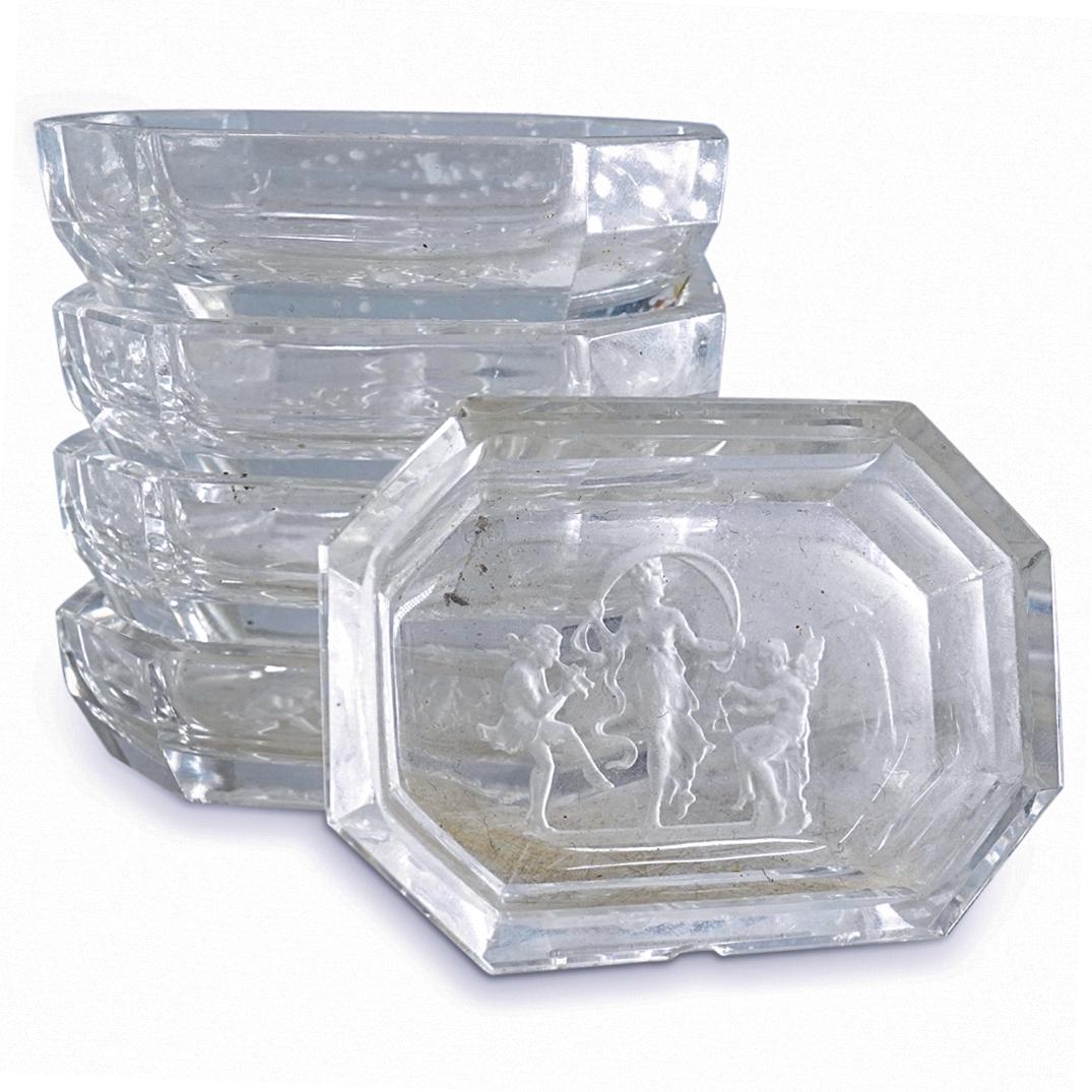 (5 Pc) Czech Heinrich Hoffman "Nymph Jumping Rope" Glass Dishes: DESCRIPTION: (5 Pc) A Czech Art Deco Heinrich Hoffman "Nymph Jumping Rope" etched glass small octagonal cellar dishes, in clear glass, decorated with an intaglio cut motif depicting a Nymph figure jum