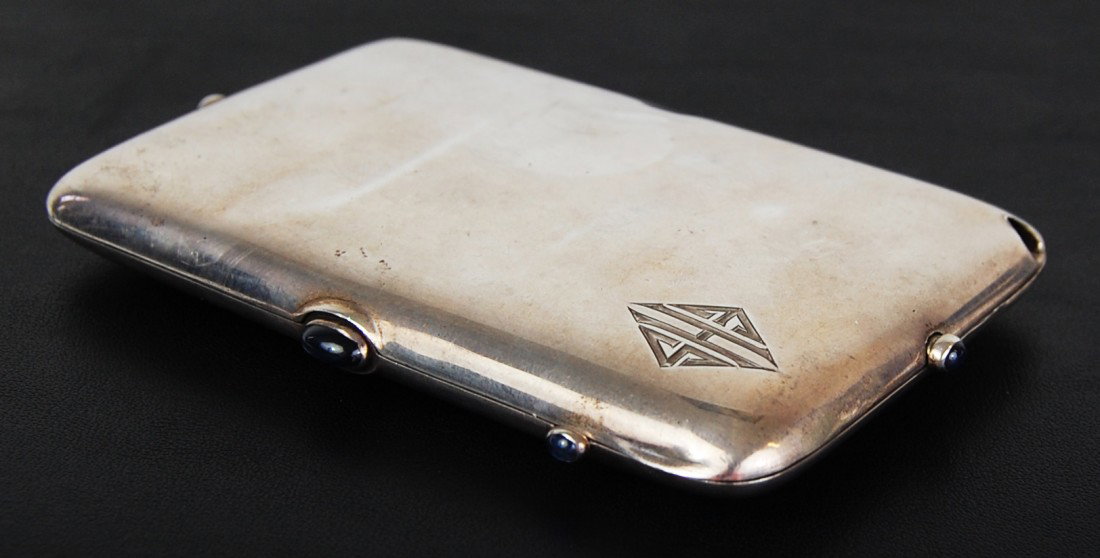 Antique sterling silver powder case with sapphires: DESCRIPTION: Sterling silver powder case with mirror inside and sapphires stones on outside CIRCA: 1920s MADE IN: USA DIMENSIONS: H:2.5" L:4" RESERVE: None